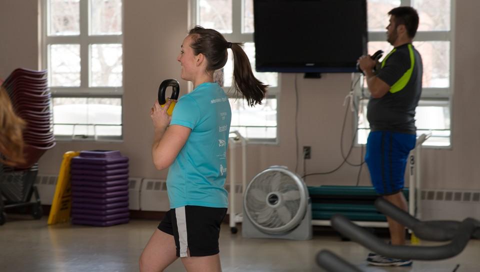 Graduate students participating in an exercise class